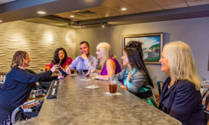 guests sitting at the bar at Old Cannery Bar